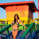  This file contains a collection of tan-through swimsuits in a classic fish print. With built-in SPF35 protection, these bikinis offer both style and sun safety. Click to shop now!