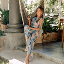 This file presents sustainable tan-through smart swimsuits adorned with a stylish Jellyfish print. Included are beach pants offering SPF15 protection, combining luxury with sun-safe comfort.