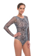This file features sustainable tan-through smart swimsuits adorned with a Fake Zebra print. With a one-piece swimsuit design featuring sleeves, it offers an elegant and luxurious beachwear option.