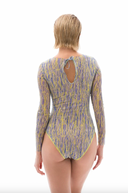 It seems you are describing a file featuring sustainable tan-through smart swimsuits adorned with an iconic 3D pen print. These one-piece swimsuits with sleeves offer chic silhouettes for sophisticated beach style