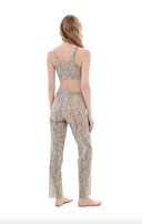 This file contains a description of a tan-through, innovative, sustainable burkini set with a 3DPen print. The set includes a top, leggings, and a tunic, offering classic luxury for modest fashion. The description also includes a call to action to shop for this stylish swimwear.