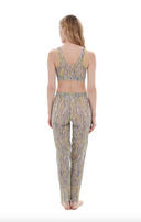 This file contains a description of a tan-through, innovative, sustainable burkini set with a 3DPen print. The set includes a top, leggings, and a tunic, combining classic luxury and modest fashion. The description also includes a call to action to shop for this stylish and eco-friendly swimwear.